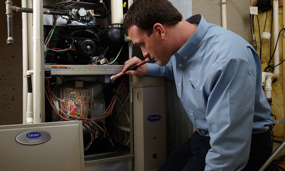 a-carrier-dealer-performs-hvac-emergency-repair-on-furnace (1)